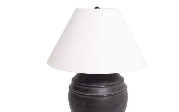 Transitional Laurel Charcoal table lamp with round gray ceramic base and white fabric tapered shade, ideal for bedside or accent lighting.