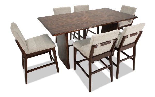 Mango 7 Piece Mid-Century Modern Dining Set with 72" solid mango wood counter height table and six beige polyester-upholstered Bob-O-Pedic stools.