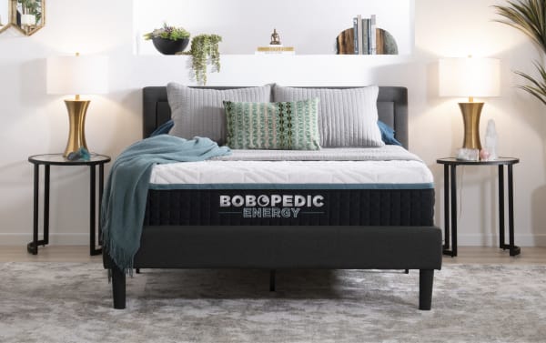 King firm Power Bob Elite Base bed with 14-inch Bob-O-Pedic Energy mattress featuring gel-grid, memory foam, charcoal, and dark gray upholstered frame.