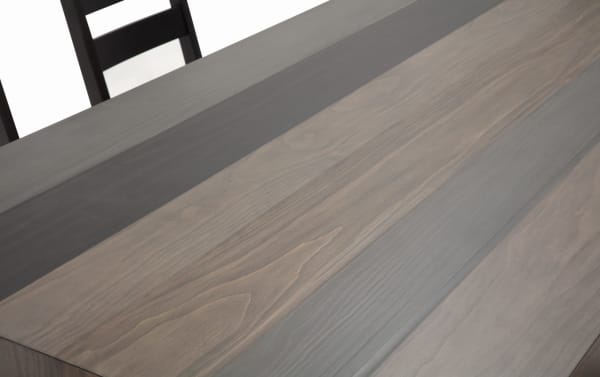 Rustic Canyon 7 Piece Gray Faux Leather Upholstered Dining Set featuring a multi-tone gray MDF wood table with sleek faux leather accents.