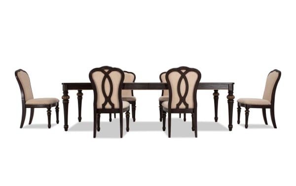 Regency 7 Piece Brown & Beige Upholstered Extendable Dining Set with traditional fluted legs, beige polyester fabric chairs, and oak veneer table.