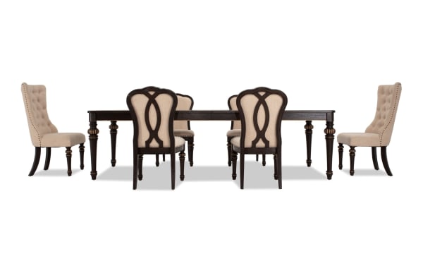 Regency 7 Piece Brown & Beige Upholstered Extendable Dining Set with traditional fluted legs, beige polyester fabric chairs, oak veneer table, and nailhead trim.