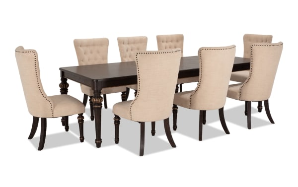 Regency 9 Piece Brown & Beige Upholstered Extendable Dining Set with traditional fluted legs, beige polyester fabric chairs, oak veneer table, and nailhead trim.