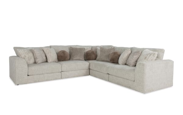 Posh Beige 134" 5 Piece Modular Sectional in transitional style with plush beige polyester fabric, gel-infused memory foam cushions, and 14 accent pillows.