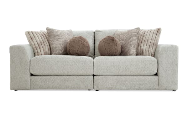 Posh Beige 100'' 2 Piece Modular Loveseat with plush beige polyester fabric, transitional style, Bob-O-Pedic gel memory foam, and eight accent pillows.