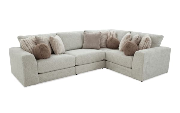 Posh Beige 139'' 4-piece modular sectional in beige polyester fabric with plush cushions, 13 accent pillows, and transitional style upholstery.