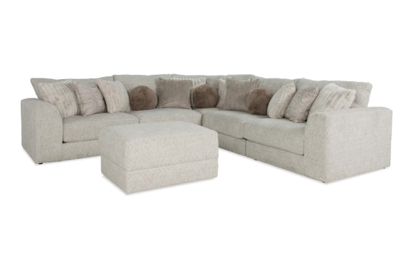 Posh Beige 134'' 6-piece modular sectional with plush polyester fabric, Bob-O-Pedic gel memory foam, 14 accent pillows, and storage ottoman.