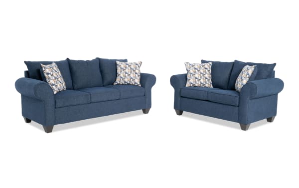 Kylie Navy 92'' Sofa and 70'' Loveseat set in blue polyester fabric with roll arms, transitional style, memory foam cushions, and patterned accent pillows.