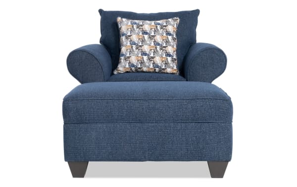 Kylie Navy Chair & Storage Ottoman in blue polyester fabric with transitional style, rolled arms, cushioned back, accent pillow, and hidden ottoman storage.