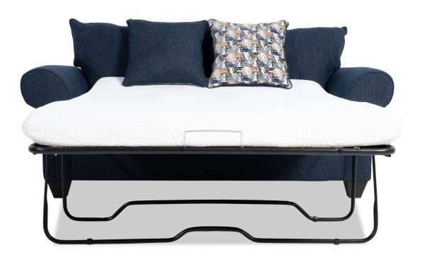 Kylie Navy 82'' transitional sleeper sofa in blue polyester fabric with rolled arms, accent pillows, and a pull-out full gel memory foam mattress.