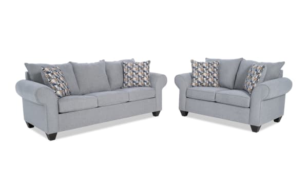 Kylie Gray 92'' Sofa and 70'' Loveseat set in gray polyester fabric with transitional style, featuring roll arms, plush cushions, memory foam seating, and patterned accent pillows.