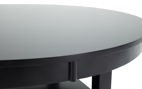 Contemporary London Black Round Dining Table from London Dining collection, featuring a smooth black MDF top and sturdy round frame.