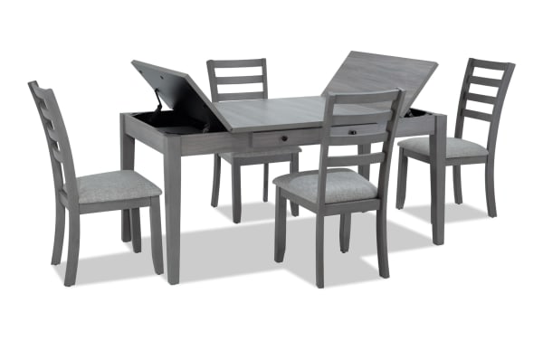 Homeworks 5 Piece Gray Dining Set with transitional style, featuring a gray melamine lift-top storage table and four gray fabric-upholstered ladder-back chairs with memory foam seats.