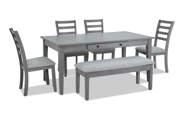 Homeworks 6 Piece Gray Dining Set with Storage Bench, featuring a transitional style gray melamine and rubberwood table with lift-top storage, felt-lined drawers, a fabric-upholstered storage bench, and four ladder-back chairs with memory foam seats.