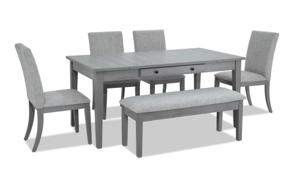 Homeworks 6 Piece Gray Upholstered Dining Set with storage bench, four fabric polyester chairs, transitional style, rubberwood frame, melamine finish, and memory foam cushions.