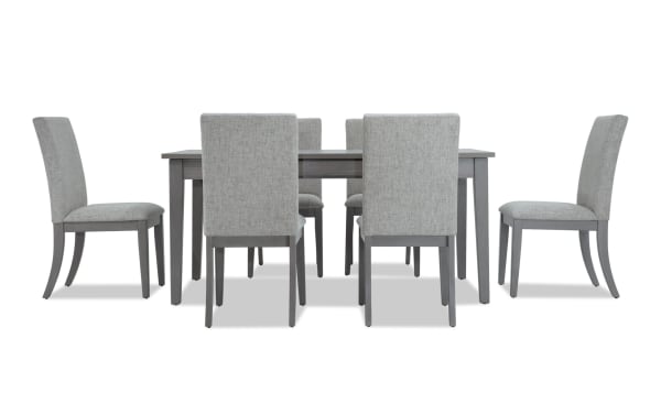 Homeworks 7 Piece Gray Upholstered Dining Set with melamine table, lift-top storage, felt-lined drawers, and six gray polyester fabric chairs with memory foam.