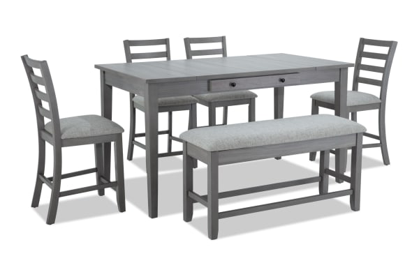 Homeworks 6 Piece Gray Counter Height Dining Set with storage bench, ladder back stools, and lift-top table storage. Transitional style with gray melamine, rubberwood frame, and polyester fabric upholstery. Durable, moisture-resistant finish and memory foam seating for comfort.