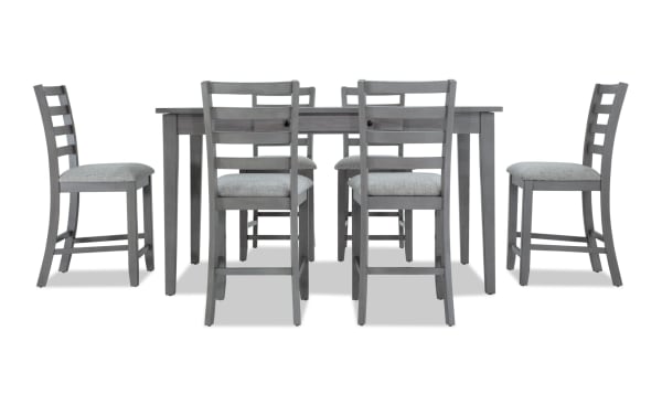 Homeworks 7 Piece Gray Counter Height Dining Set with melamine table, lift-top storage, felt-lined drawers, and six gray fabric-upholstered ladder back stools.