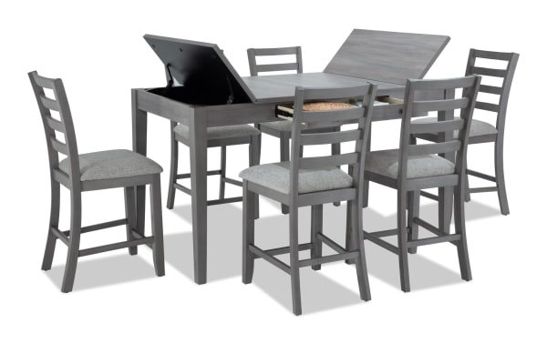 Homeworks 7 Piece Gray Counter Height Dining Set with lift-top storage, felt-lined drawers, six gray ladder-back stools with polyester upholstery and memory foam seats, made of melamine board, MDF, plywood, rubberwood solids, and veneers in a transitional style.