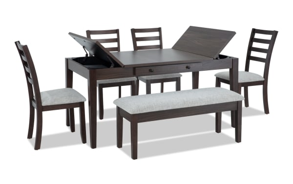 Homeworks 6 Piece Dark Brown & Gray Dining Set with Storage Bench features a transitional style rubberwood frame, melamine tabletop with lift-top storage, felt-lined drawers, four ladder-back chairs, and a cushioned gray fabric bench with memory foam upholstery.