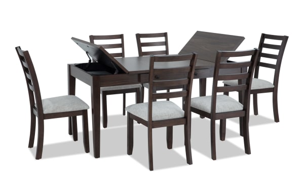 Homeworks 7 Piece Dark Brown & Gray Dining Set with lift-top storage table, six gray fabric-upholstered ladder-back chairs, transitional style, durable melamine and rubberwood frame.