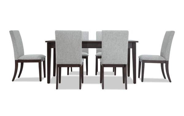 Homeworks 7 Piece Dark Brown & Gray Upholstered Dining Set with six gray polyester fabric chairs and a dark brown melamine-finished rubberwood table featuring lift-top storage and felt-lined drawers.