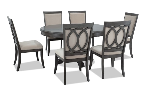 Coco II 7 Piece Gray & Beige Upholstered Oval Dining Set with Asian hardwood, cherry veneers, beige polyester fabric, and six upholstered side chairs.