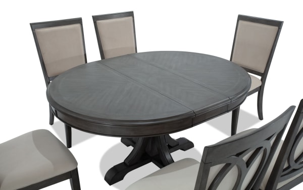 Coco II 7 Piece Gray & Beige Upholstered Oval Dining Set with Asian hardwood, cherry veneer table, 18" leaf, and six beige polyester fabric chairs in contemporary style.