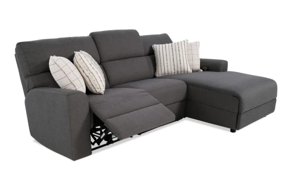 Modern Farmhouse gray 106" fabric polyester sectional with right arm chaise, power reclining seats, headrests, USB ports, cupholders, and storage.