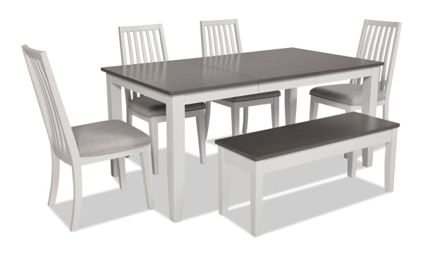 Blake 6 Piece White & Gray Upholstered Dining Set with four cushioned polyester fabric chairs, extendable MDF and hardwood table, and storage bench in transitional style.