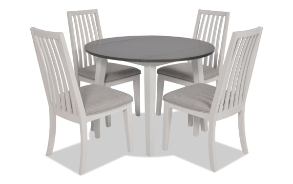 Blake 5 Piece White & Gray Upholstered Dining Set with drop leaf gray table, four white slat-back chairs, and padded polyester fabric seats.
