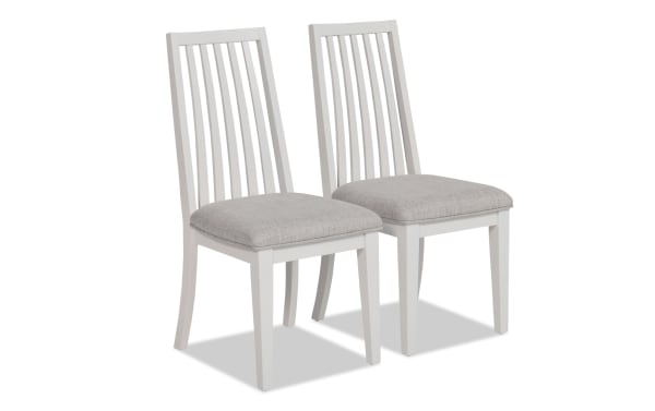 Set of 2 Blake White & Gray Windsor upholstered dining chairs with gray polyester fabric seats, hardwood slat backs, and transitional style.