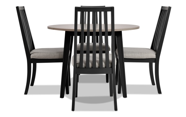 Blake 5 Piece Graphite & Gray Upholstered Dining Set with round drop leaf MDF table and four gray fabric polyester cushioned slat-back chairs in transitional style.