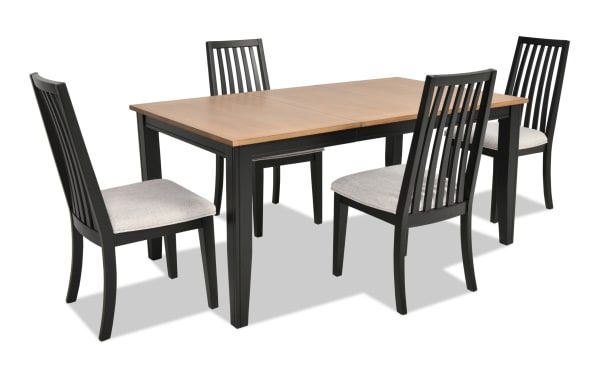 Blake 5 Piece Black & Natural Upholstered Dining Set with extendable wood table and four gray polyester fabric cushioned slat-back chairs in transitional style.