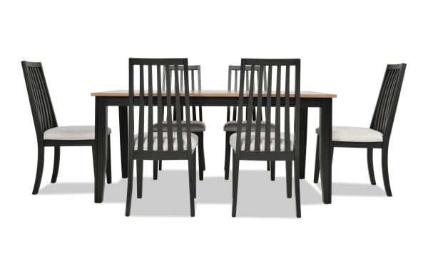 Blake 7 Piece Black & Natural Upholstered Dining Set with six gray polyester fabric chairs and extendable wood table in transitional farmhouse style.