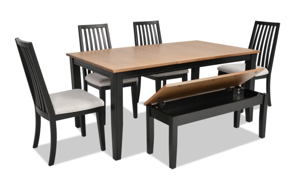 Blake 6 Piece Black & Natural Upholstered Dining Set with Storage Bench features a transitional gray finish, fabric polyester cushioned chairs, an extendable MDF and hardwood table, and a storage bench with birch veneer accents.