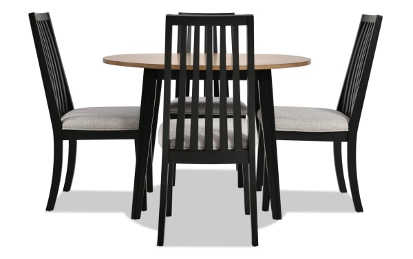 Blake 5 Piece Black & Natural Upholstered Dining Set with round drop leaf table, four gray fabric cushioned slat-back chairs, transitional style, MDF and hardwood construction.
