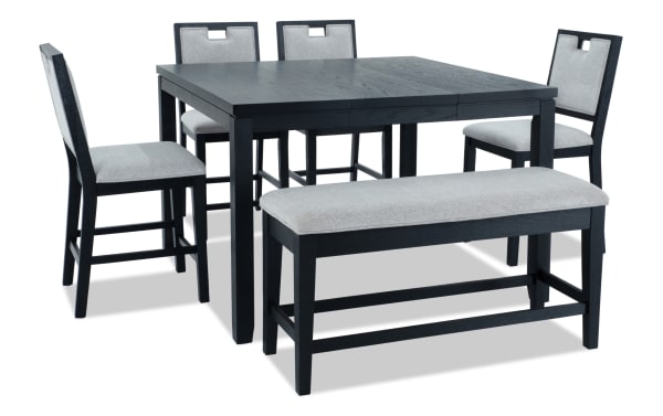 Brookline 6-piece black and white upholstered counter height dining set with square MDF and solid wood table, fabric polyester cushioned chairs, and storage bench in transitional style.