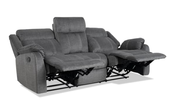 Lagoon Gray 81'' manual reclining sofa in transitional style with soft polyester fabric upholstery, featuring dual recliners and plush cushioning for customizable comfort.