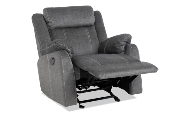 Lagoon Gray Manual Gliding Recliner in transitional style with soft polyester fabric upholstery, featuring padded armrests and adjustable manual recline function.