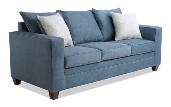 Tracy Teal 82'' transitional sofa in blue polyester fabric with clean lines, three seat cushions, and included accent pillows for stylish comfort.