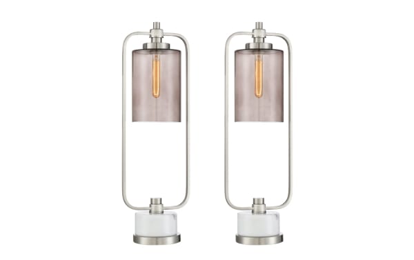 Set of 2 Liam transitional table lamps with brushed nickel metal frames, smoky glass shades, and white marble bases for modern home decor.