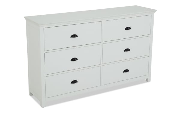 Newport White 6 Drawer Dresser in transitional style, made of MDF, rubberwood solids, and particle board, with black cup handles for bedroom storage.