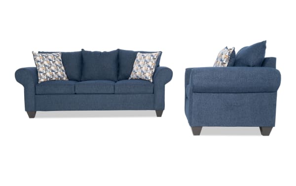 Kylie Navy 92'' transitional sofa and chair set in blue polyester fabric with rolled arms, memory foam cushions, no-sag springs, and patterned accent pillows.