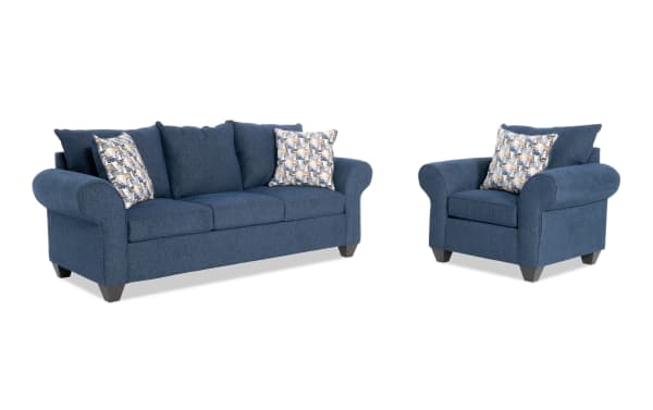 Kylie Navy 92'' transitional sofa and chair set in blue polyester fabric with roll arms, memory foam cushions, no-sag springs, and patterned accent pillows.