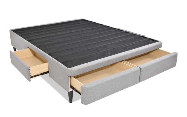 Universal Twin Gray Upholstered Storage Platform Bed with four spacious fabric-covered polyester drawers, MDF frame, and no mattress foundation needed.