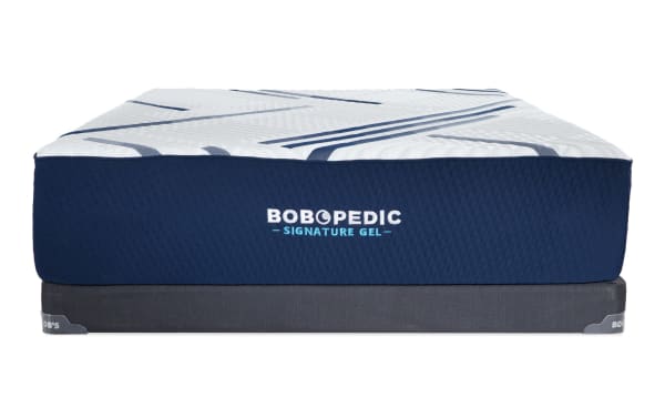 Signature Gel 13.5'' Queen Plush Low Profile Mattress Set by Bob-O-Pedic, featuring a white quilted top with blue geometric accents and a navy blue side panel with logo, designed for ultra-cooling gel memory foam comfort and durable mattress foundation.