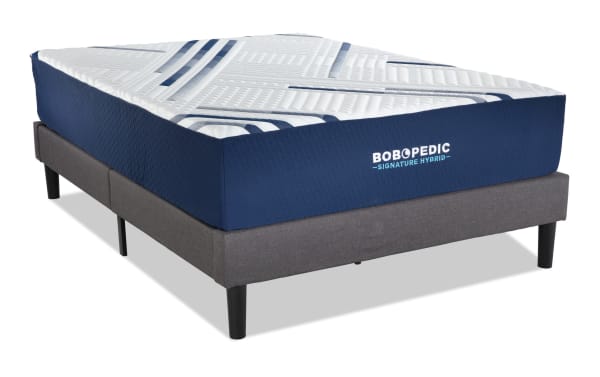 Signature Hybrid 13.5'' King Plush Universal Mattress Set by Bob-O-Pedic, featuring a blue and white quilted gel memory foam hybrid mattress with a gray fabric foundation frame.