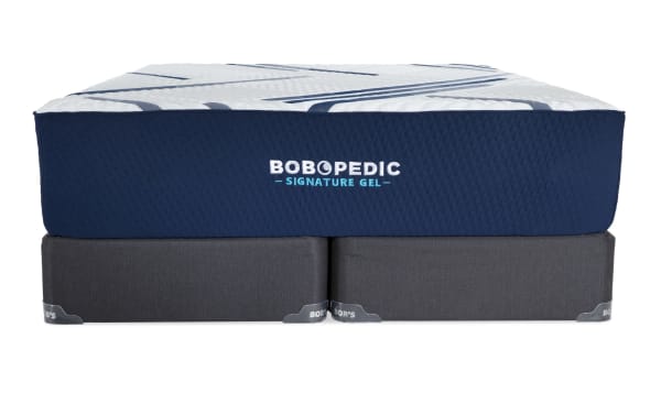 Bob-O-Pedic Signature Gel 13.5'' Queen Firm Split Standard Mattress Set with ultra-cooling cover, blue and white quilted top, and dark gray foundation.