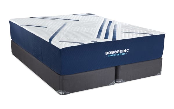 Signature Gel 13.5'' Queen Firm Split Standard Mattress Set by Bob-O-Pedic, featuring a white and blue ultra-cooling cover with gel memory foam layers and a dark gray foundation.